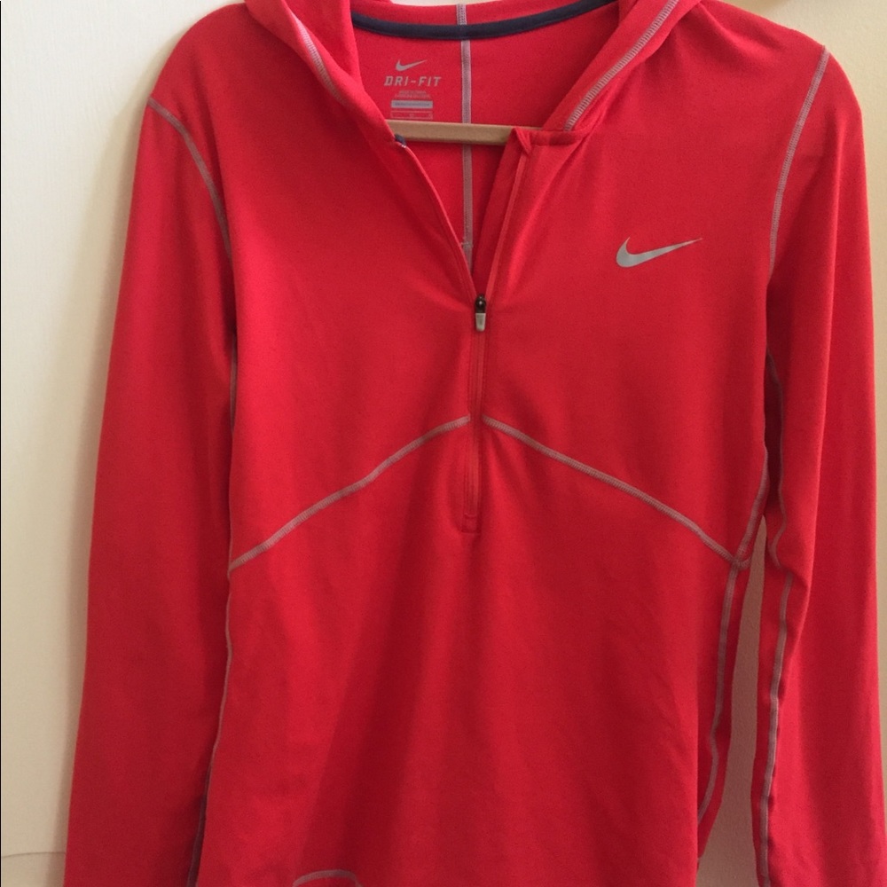 Nike size L Dri-Fit orange 3/4 zip workout top.